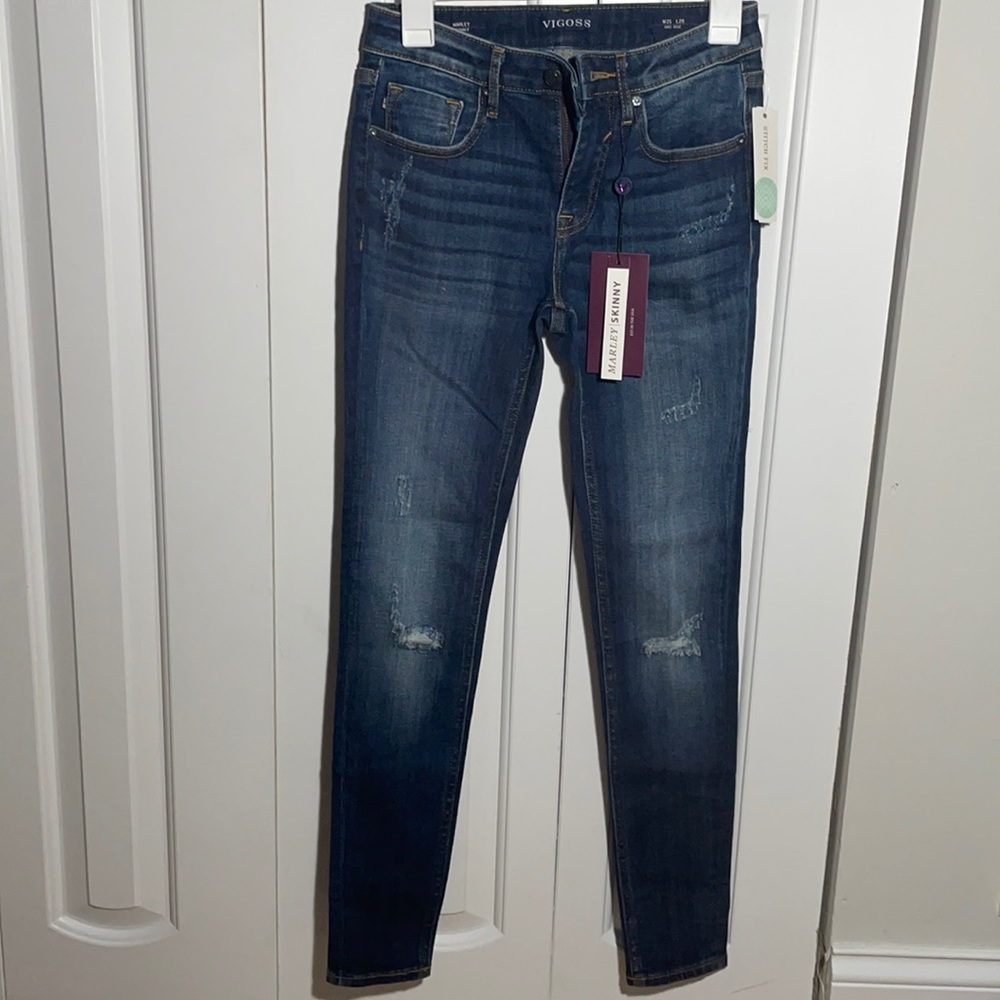 Size 25 mid rise dark jeans!